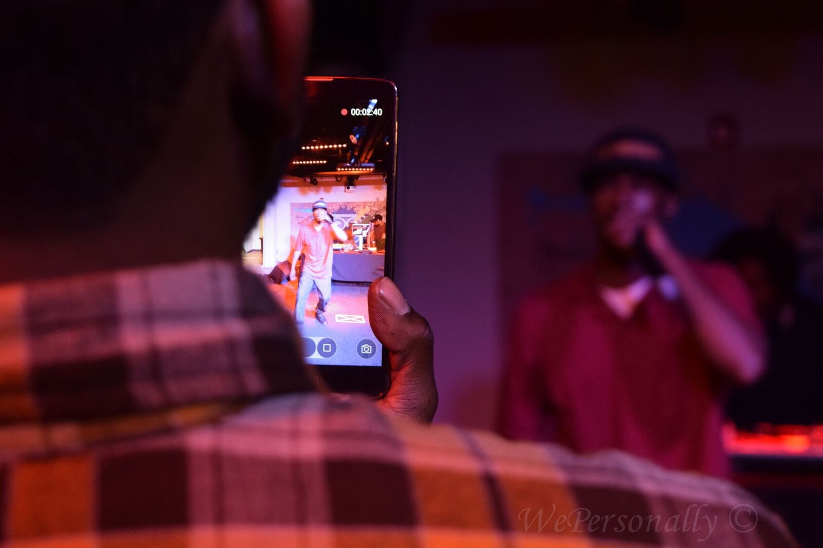 rapper on phone imurj.jpeg