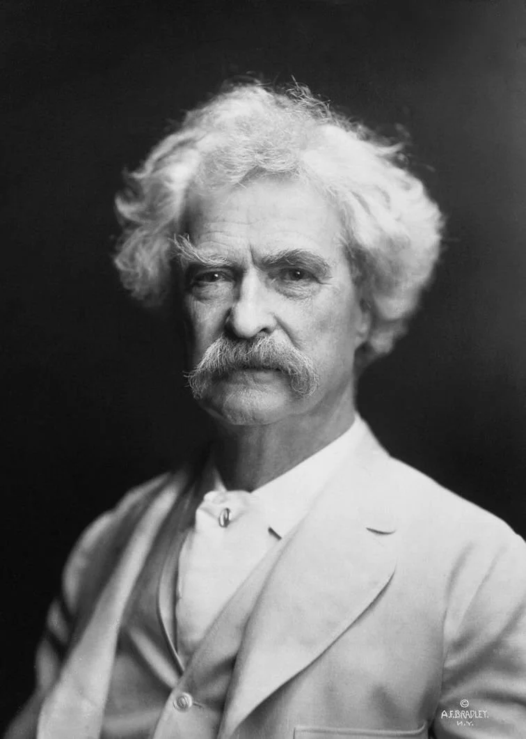A portrait of Mark Twain, American writer, taken by A. F. Bradley in New York, 1907.