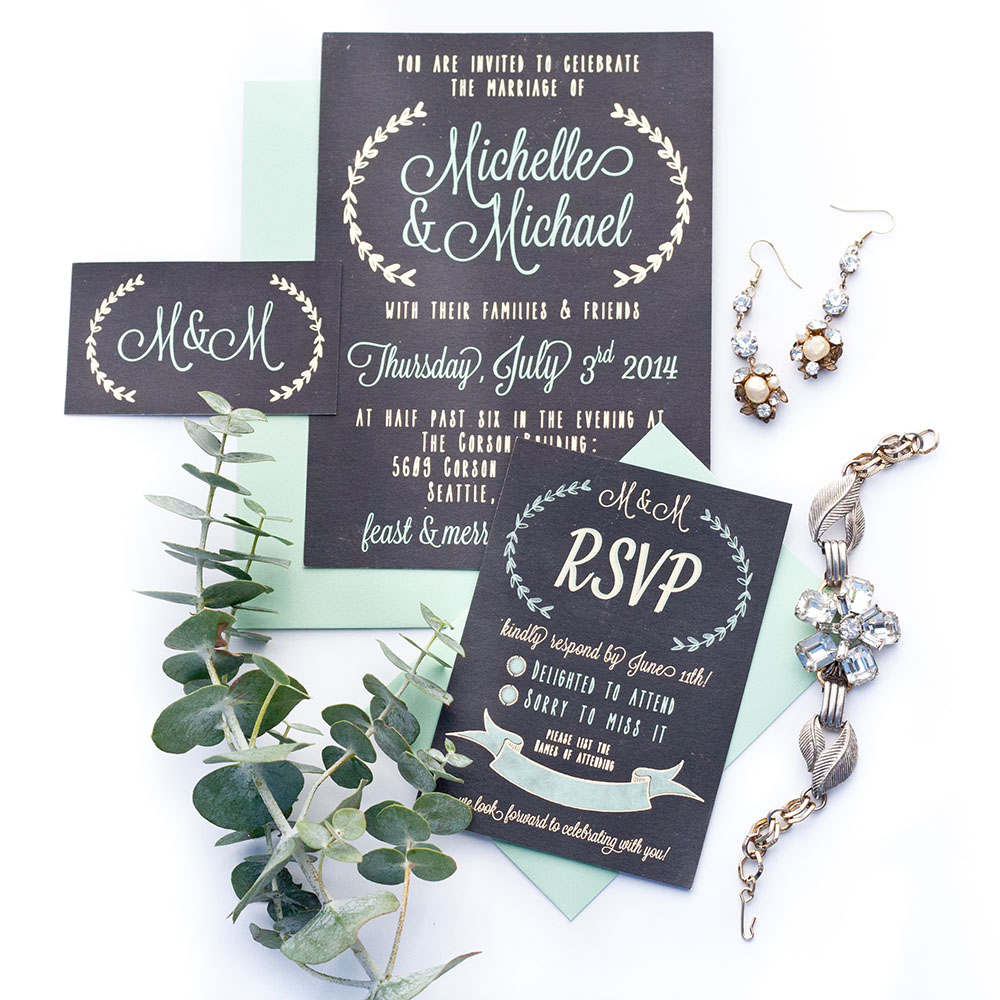 Keeping with a sweet mint and metallic gold foiled theme for Mike & Michelle's wedding, while capturing the farm house style of their venue with laurels and a slate background. 