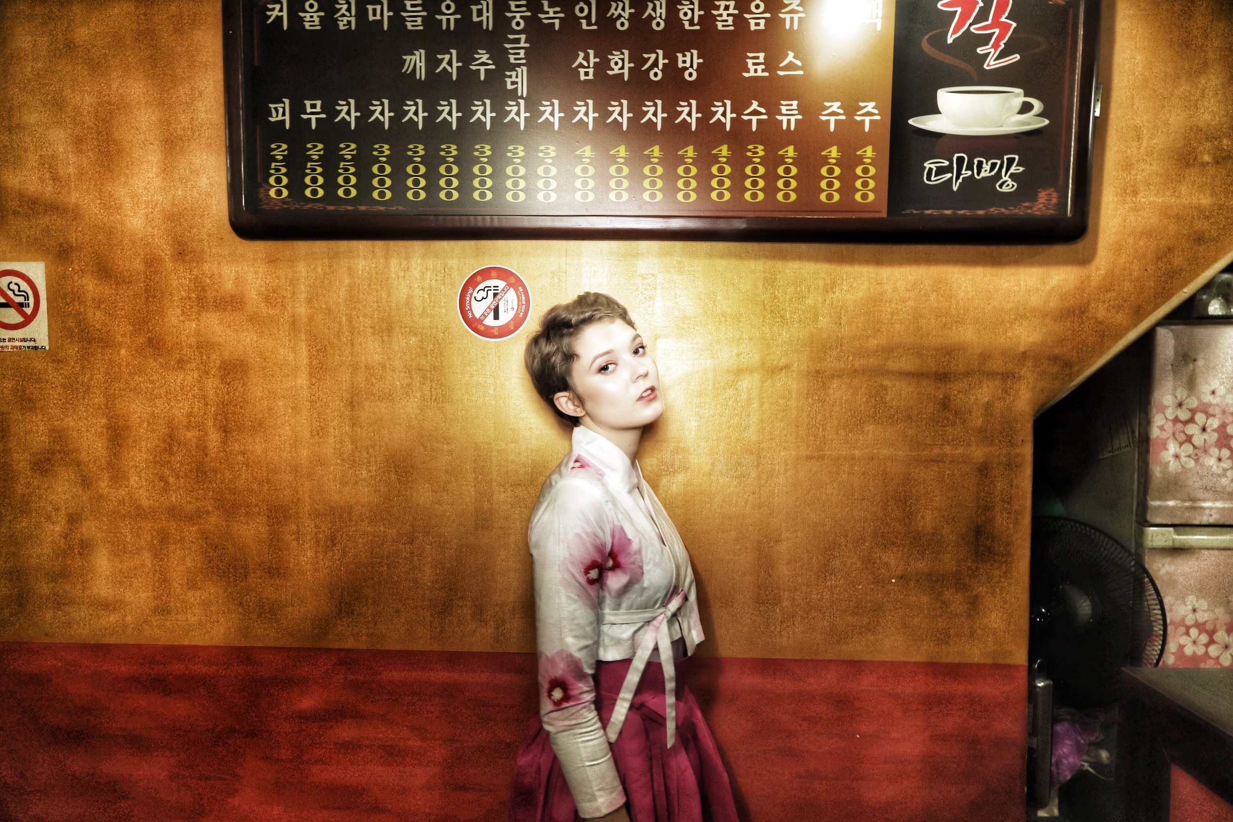 Miranda is a Finnish girl who wanted to wear a modern hanbok but with a traditional feel, along with edgy, high fashion-style photography. So we put her in a local modern hanbok designer's hanbok and found a 1970s-style Korean dabang coffee shop and used it as the perfect place to do Korea in the way she wanted. 