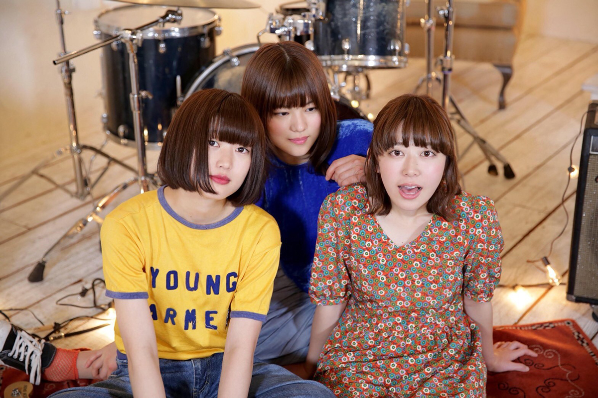 Kanako Sekizawa (bass, chorus) Naho Shibahara (drums, chorus) Chisato Kokubo (vocals, guitar) Lucie,Too is a female 3-pc indie-pop band from Utsunomiya , a town two hours by car north of Tokyo. Utsunomiya is famous for its gyoza (potstickers) but soon it'll be the city known for being the hometown of Lucie,Too. The name of the band originates from a song by US indie rock band Now Now . Chisato writes all of the songs and seems to listen to a sh*tload of US and UK twee for inspiration (eg Tiger Trap and Talulah Gosh ). She is unbelievably talented at songwriting and has a genius level aptitude for composing simple yet great songs with timeless melodies. Flanking Chisato on bass is Kanako who is the coolest bass player you could ever meet. Crazy beautiful but hiding her face behind giant bangs, so smooth yet so ill in her playing technique and footwork, charming and unpretentious in conversation and sporting pants so baggy Rick Howard would blush. (note: I grew up in Vancouver skating in the 90s and was pretty good but Rick was an alien—so naturally talented I basically gave up and quit. lol). And the backbone holding it together on skins is Naho who blends power with ultra-creative fills. She used to drum for another band from Utsunomiya named SUNNY CAR WASH but switched over to Lucie,Too to form the ultimate twee-o (*groan*.) 