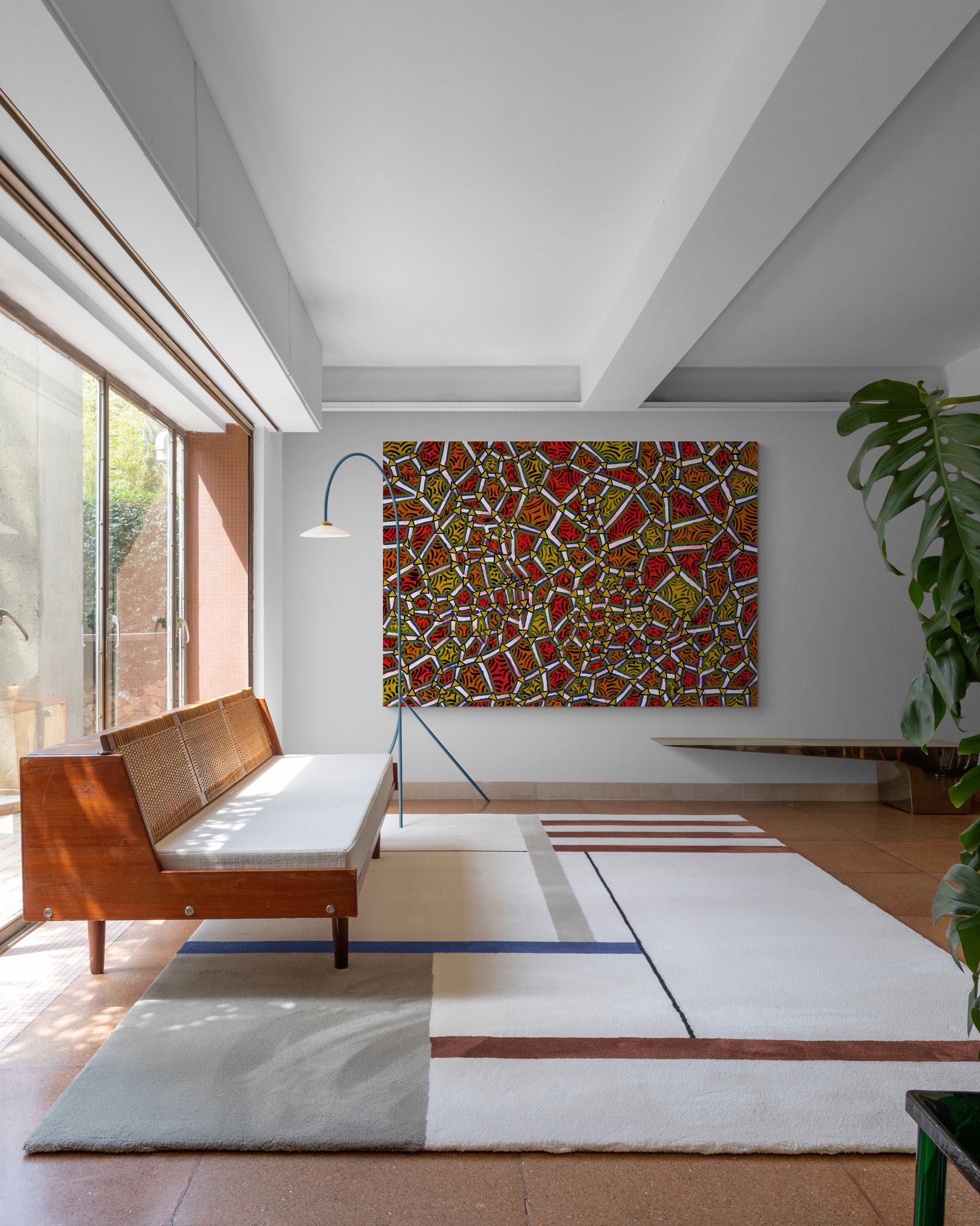 Stylish_living_room_with_large_rug.jpeg