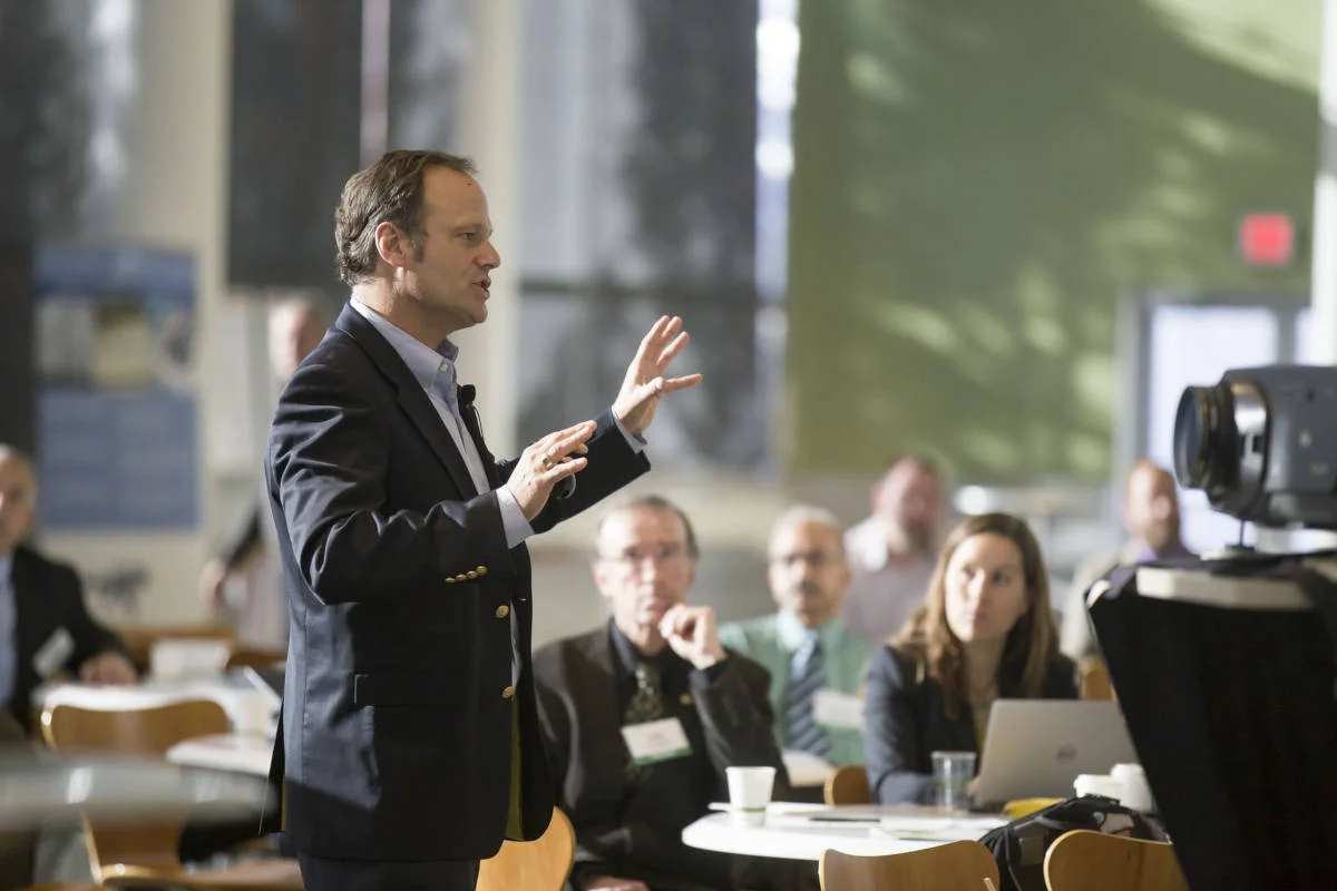 businessman speaking at conference.jpg