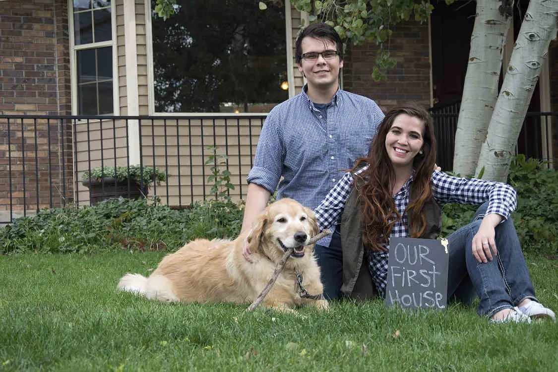 young-couple-with-dog-first-home.jpg