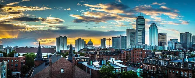 boston-massachusetts-skyline-sunset-clouds.jpg