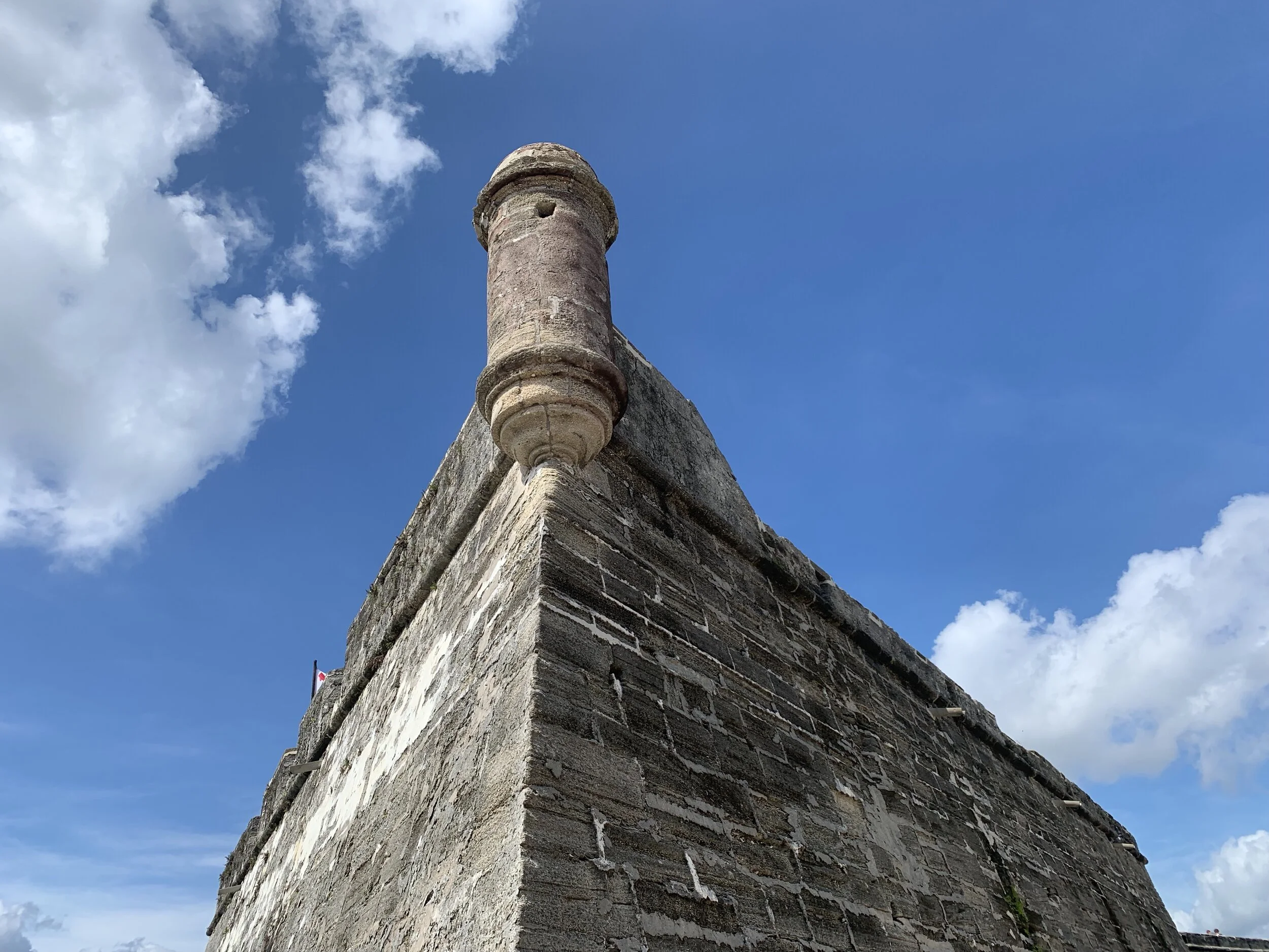 A Spanish built fortress along the Florida coast, near St. Augustine, with almost spongy walls that absorbed cannon balls like bbs into styrofoam, looking out over waters that played a role in the Florida Holy Wars of the 1560s, with Catholic Spania…