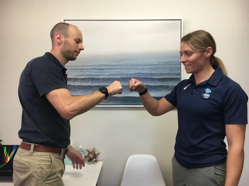 The “Air Bump” - a Stack St Physio-sanctioned method of greeting. No contact please!