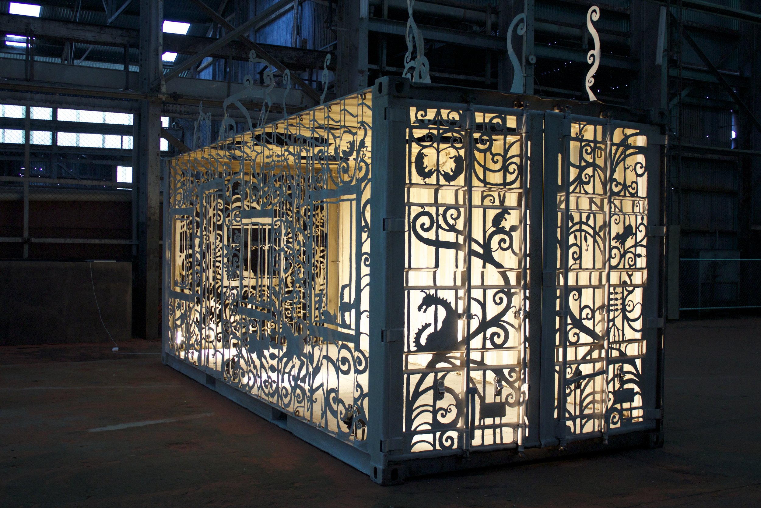 15-Domesticate,plasma-cut steel container, 20'x9'x9' 2014.jpg