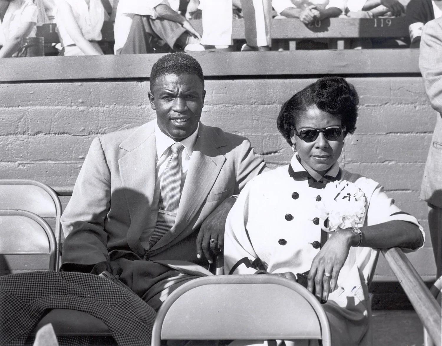 With his wife, Rachel Robinson.