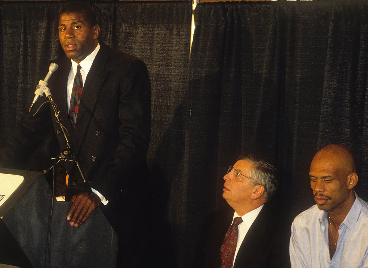 On November 7, 1991, Magic Johnson shocked the world with his announcement that he was HIV positive and, still in the prime of his career, retiring from the Lakers.