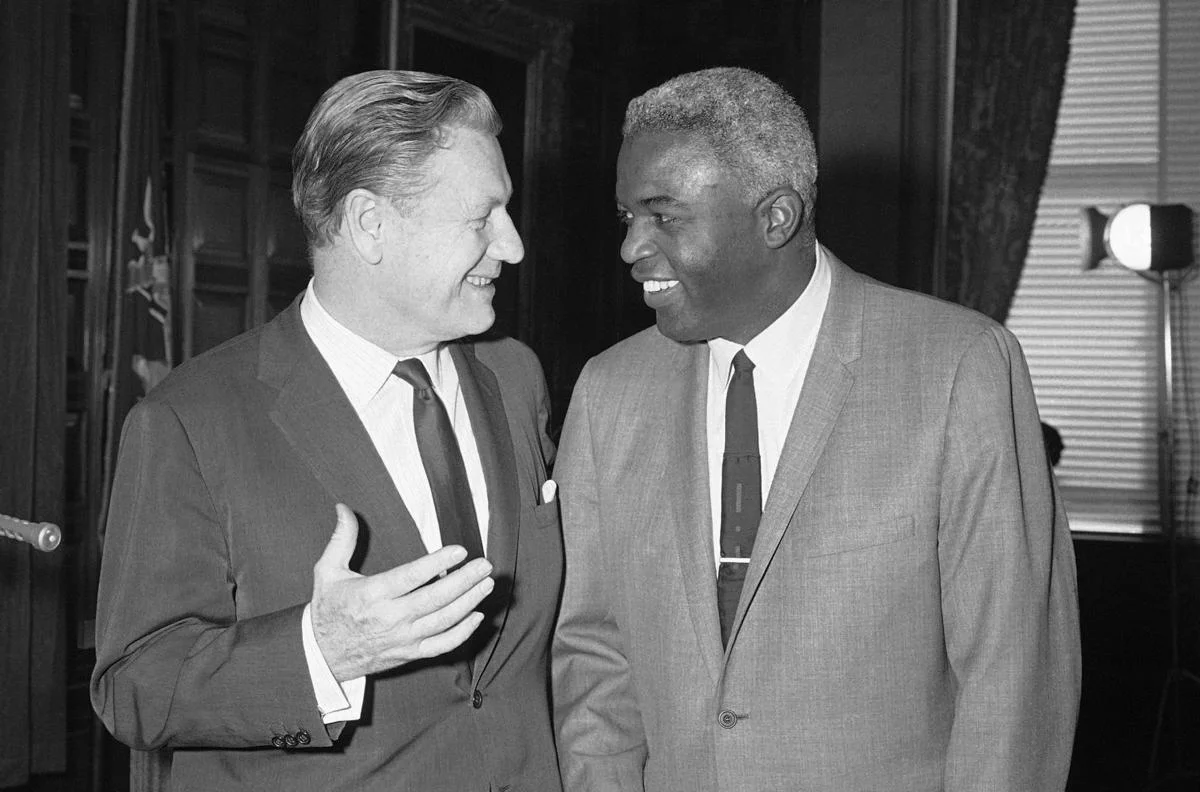 Jackie Robinson with Nelson Rockefeller.