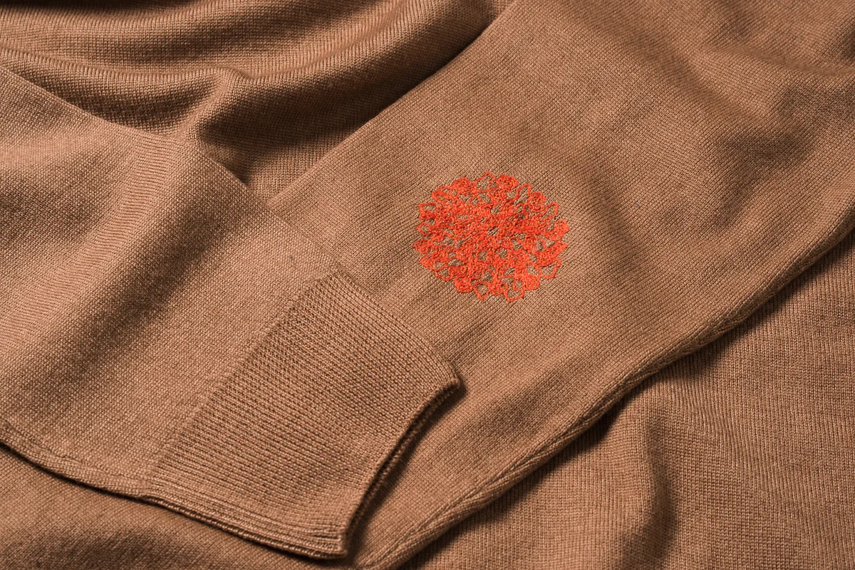 BrownSweaterElbowLogo.jpg