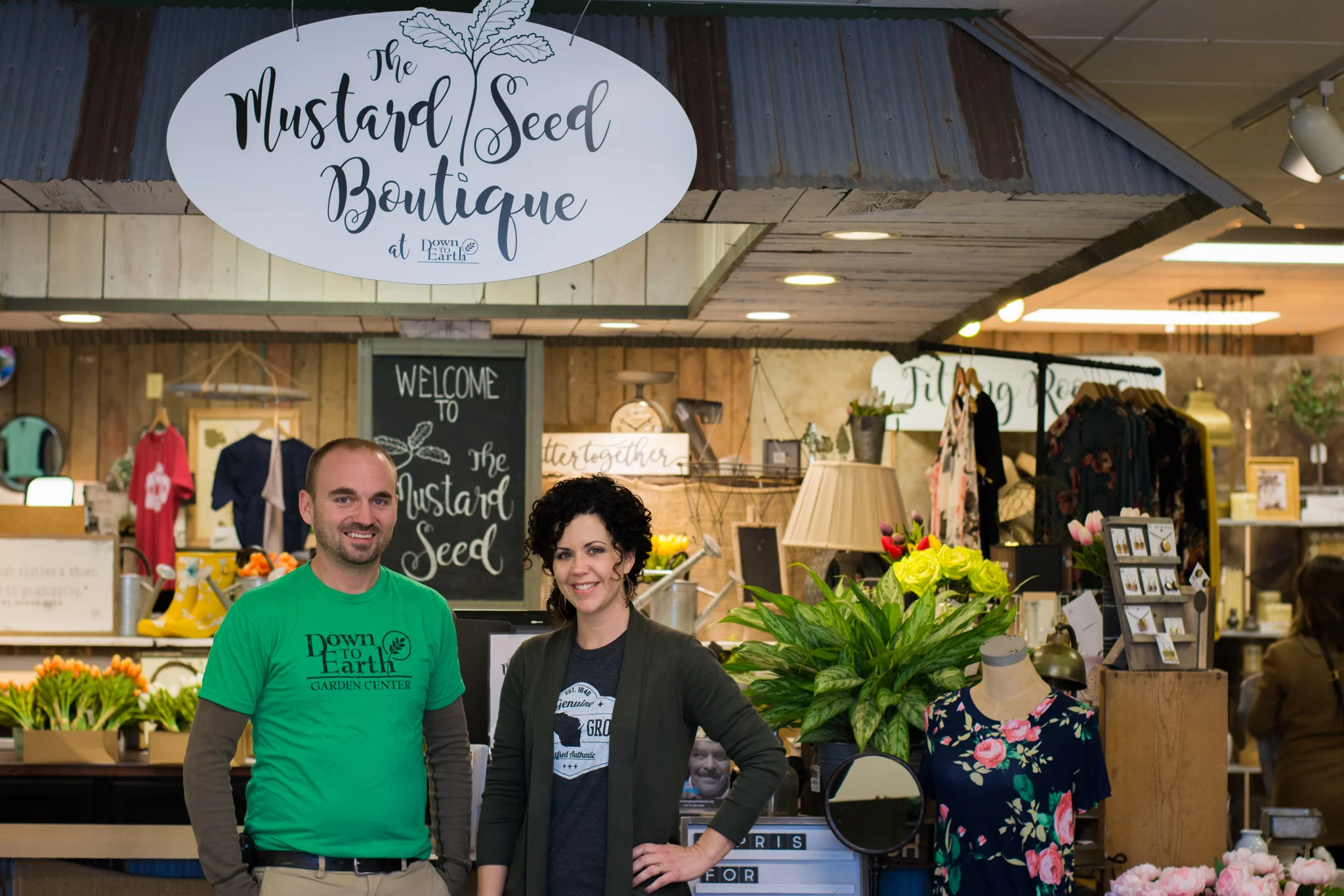 Mustard Seed Boutique and Down to Earth Garden Center co owner Ben Polzin and Mustard Seed Boutique Manager Leah Niedfeldt pose for a photo at the shop, which officially opened in March 2018.
