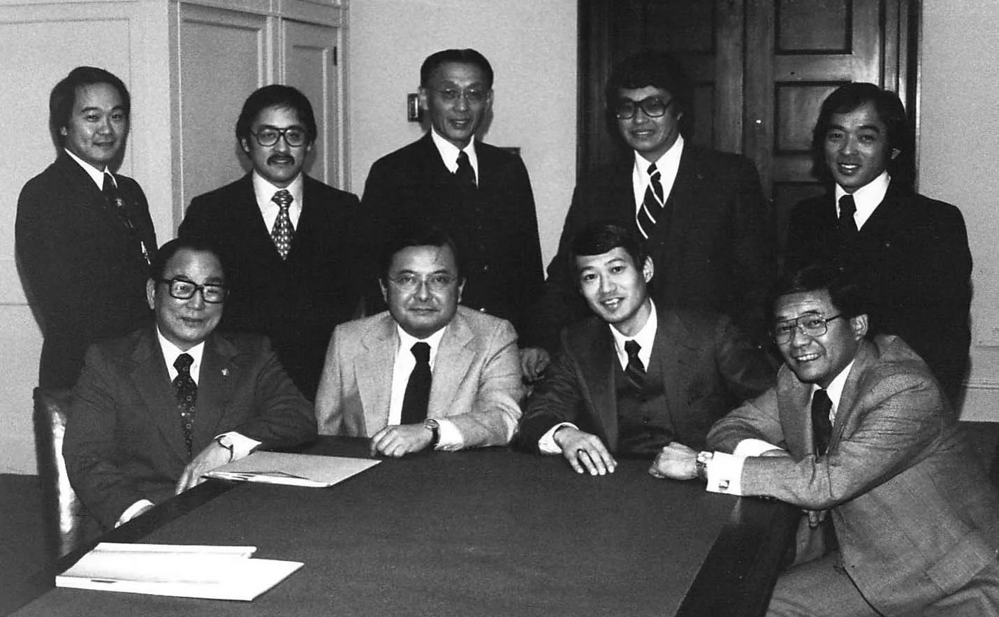 Ron Mamiya is seen in back row, second left, during a JACL’s National Committee for Redress. Other people in the photo include (back, from left) Karl Nobuyuki, Ron Mamiya, Clifford Uyeda, Ron Ikejiri, and John Tateishi. They meet with the four JA members of Congress: (front, from left) Senator Spark Matsunaga, Senator Daniel Inouye, Rep. Robert Matsui, and Rep. Norman Mineta. Photo: Ron Ikejiri / DiscoverNikkei.org