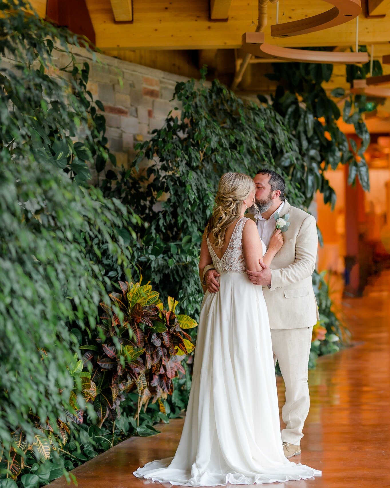 Nicole + Tony | 5.6.23

First wedding of the year, complete! Yes, it rained the entire time and honestly, it's not fully green outside anyway. Fortunately, the Bluestem Amphitheater has this gorgeous greenery wall in the Marcil Commons building, whic