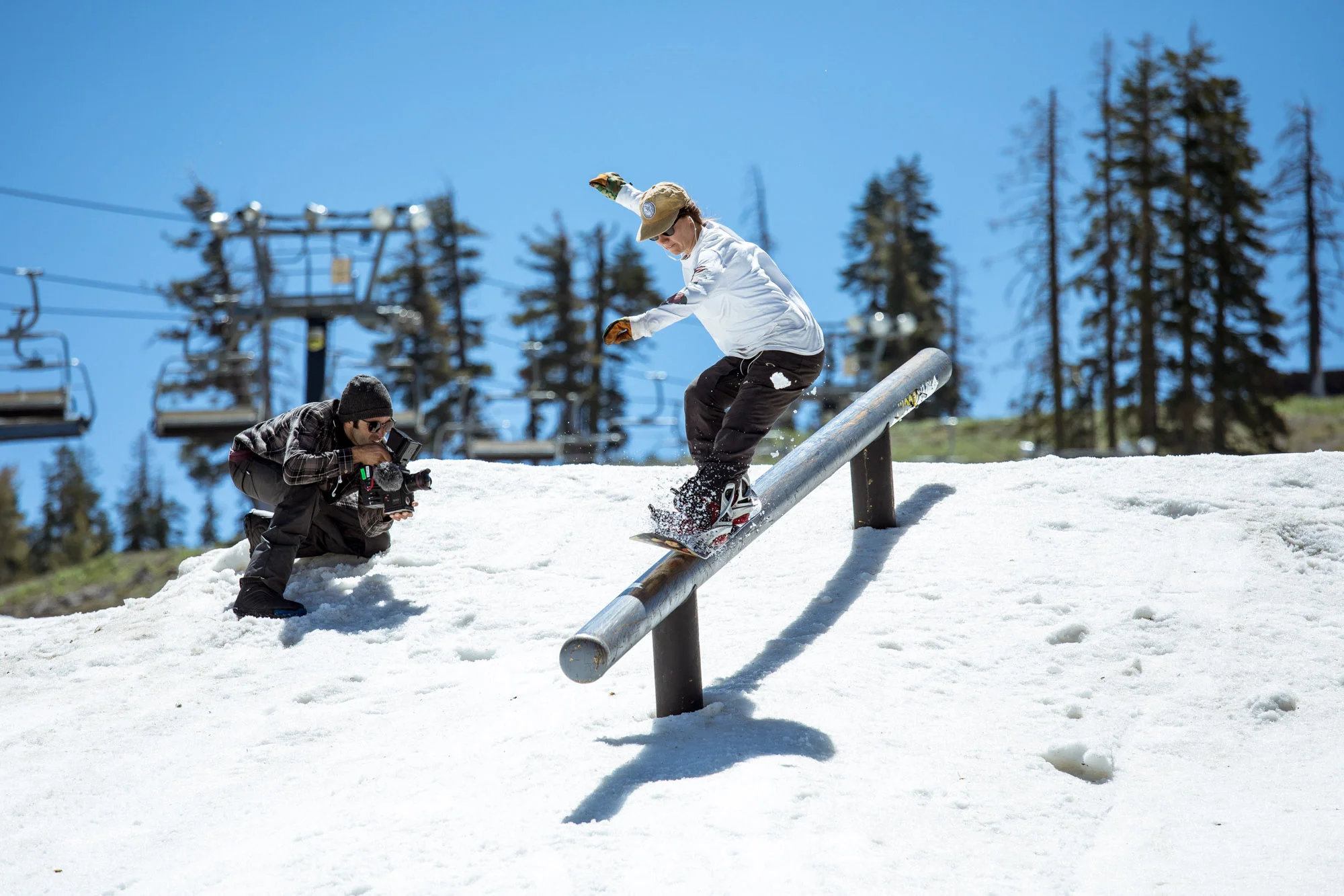 Head Coach Christine Savage 5-0 on the down bar on a perfect day in June.