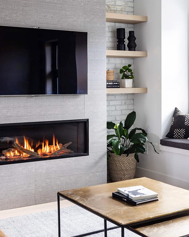 17TH AVE | Fireplace details in this cozy space we designed in Vancouver. #MD17thave