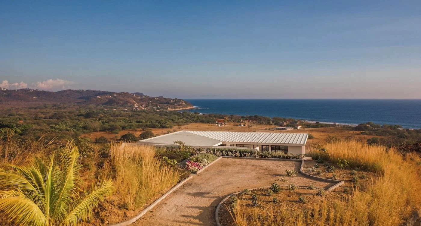 Three bedroom ocean view home with a pool overlooking the beach at