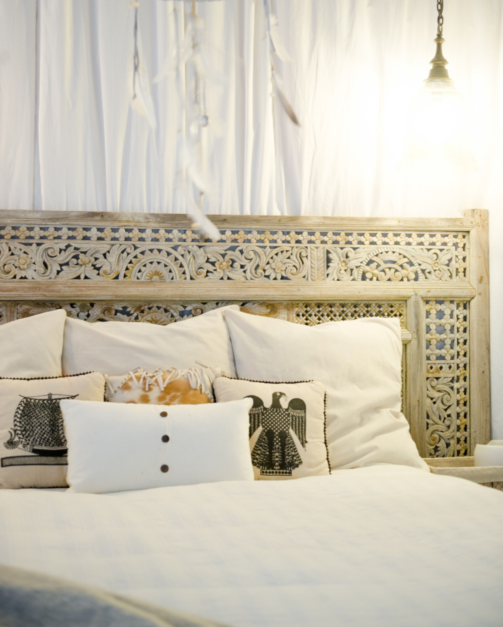 sourced-bali-carved-wood-door-headboard.png