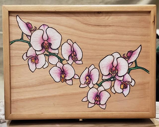 Been having a lot of fun working on some new techniques, new mediums.  Custom piece...ink and pencils on cherry wood.  #orchidart #inkonwood #inkedwood #woodart #colorfulwoodart #flowersonwood #willowswitchdesigns #customart