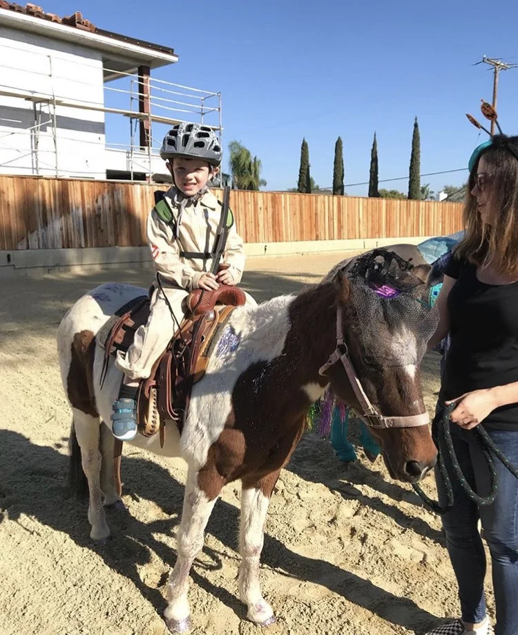 A Ghostbuster and his Unicorn