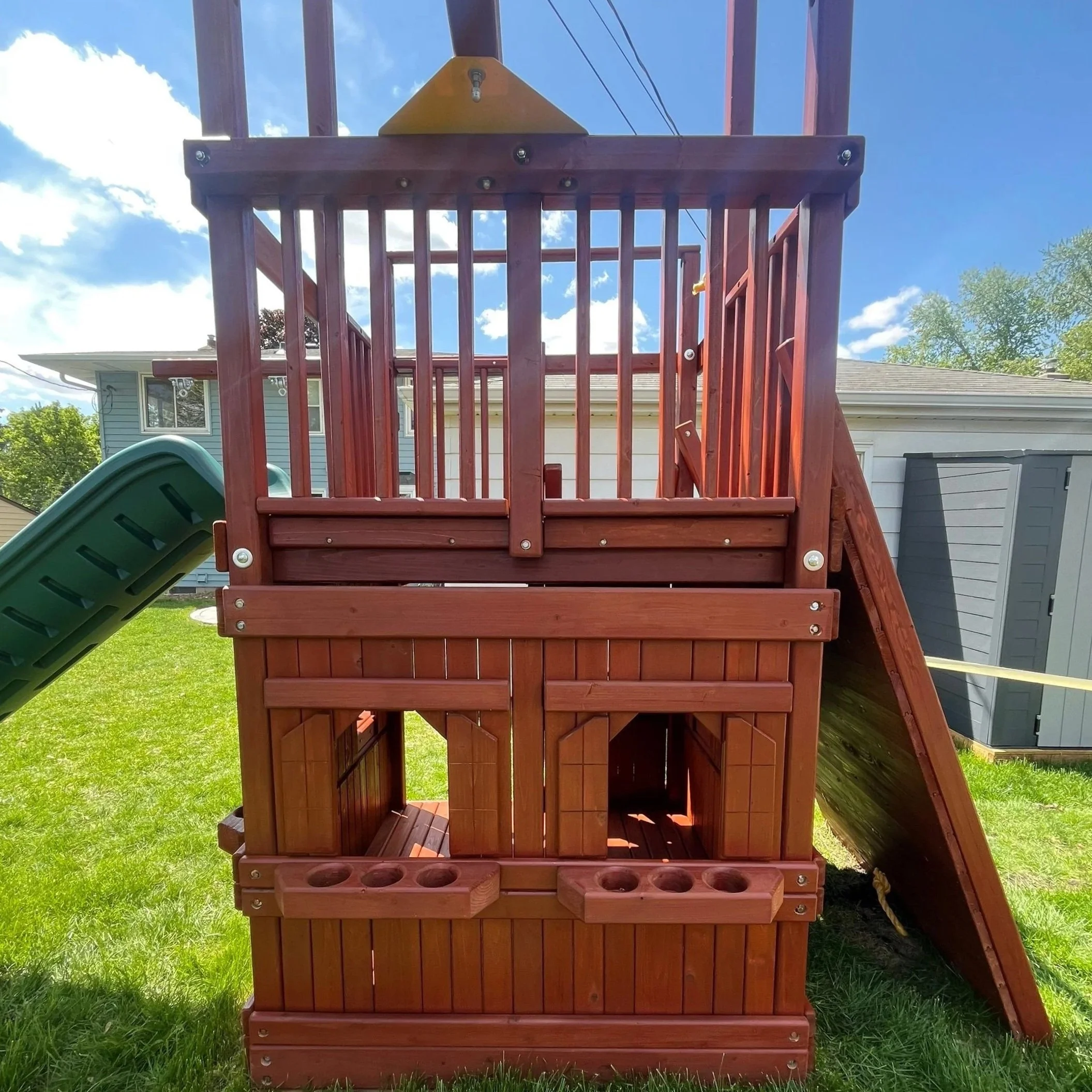 Wooden swing set after refinishing