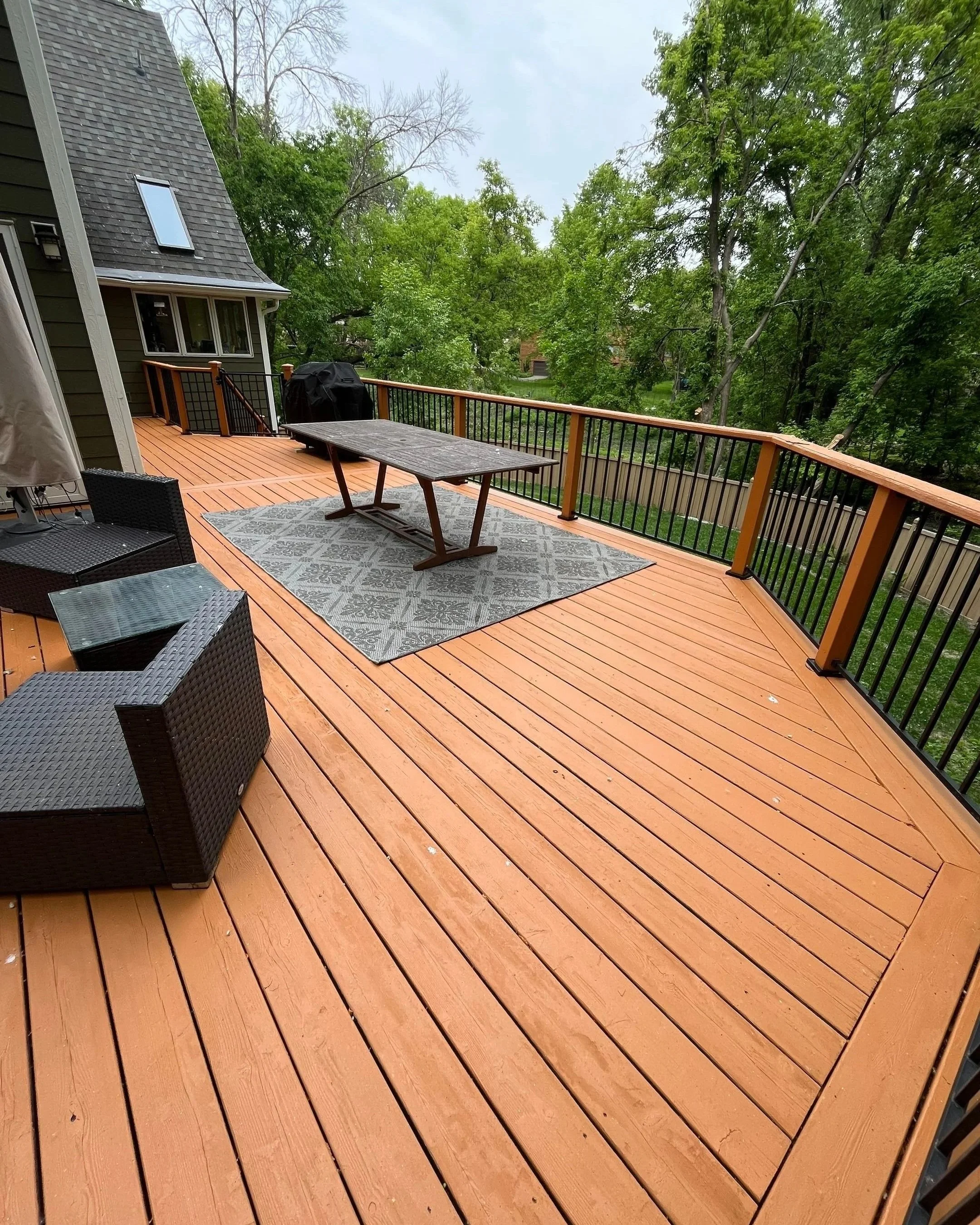 Deck with professionally applied water-based coating