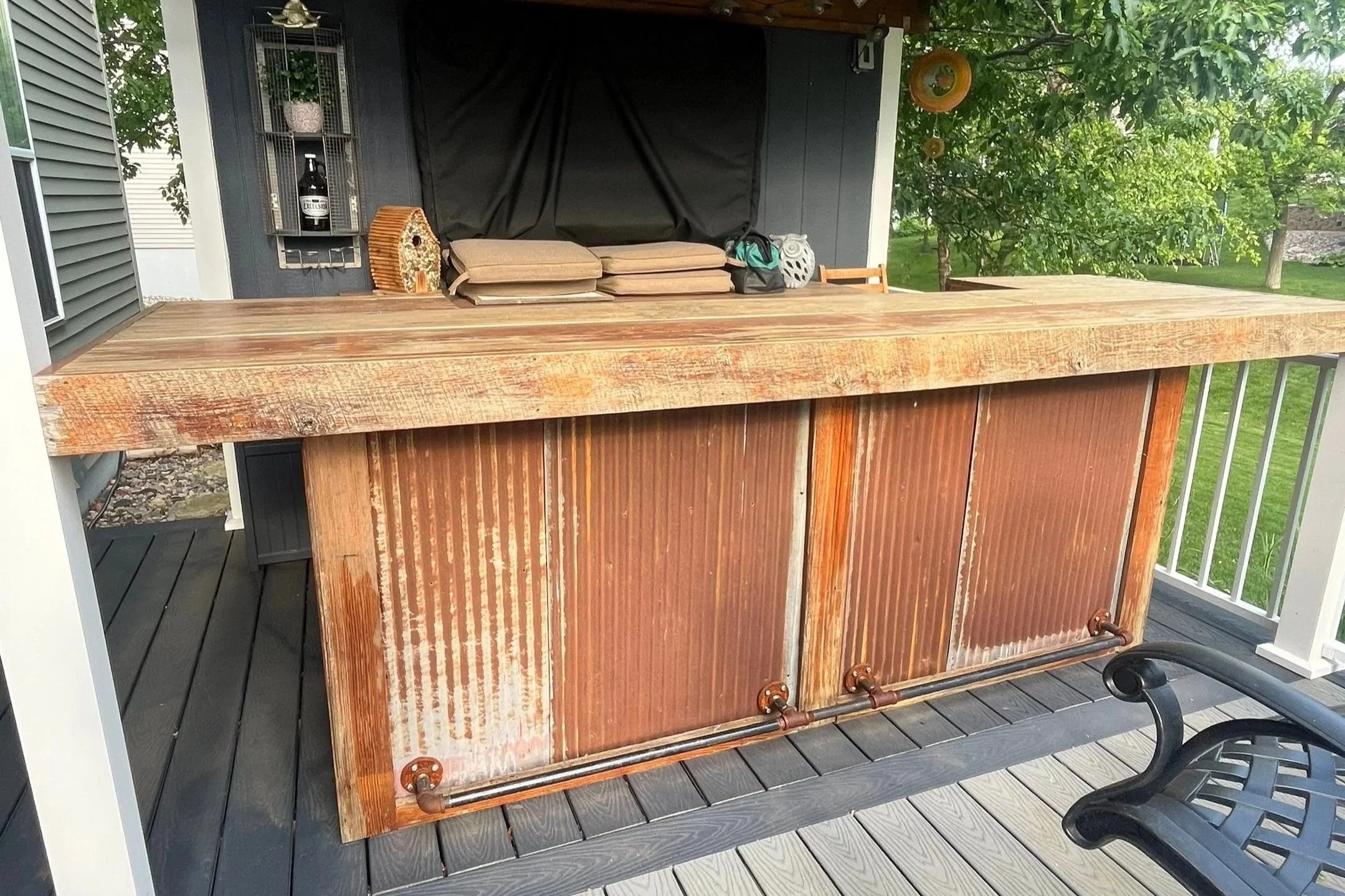 Wood outdoor bar before refinishing