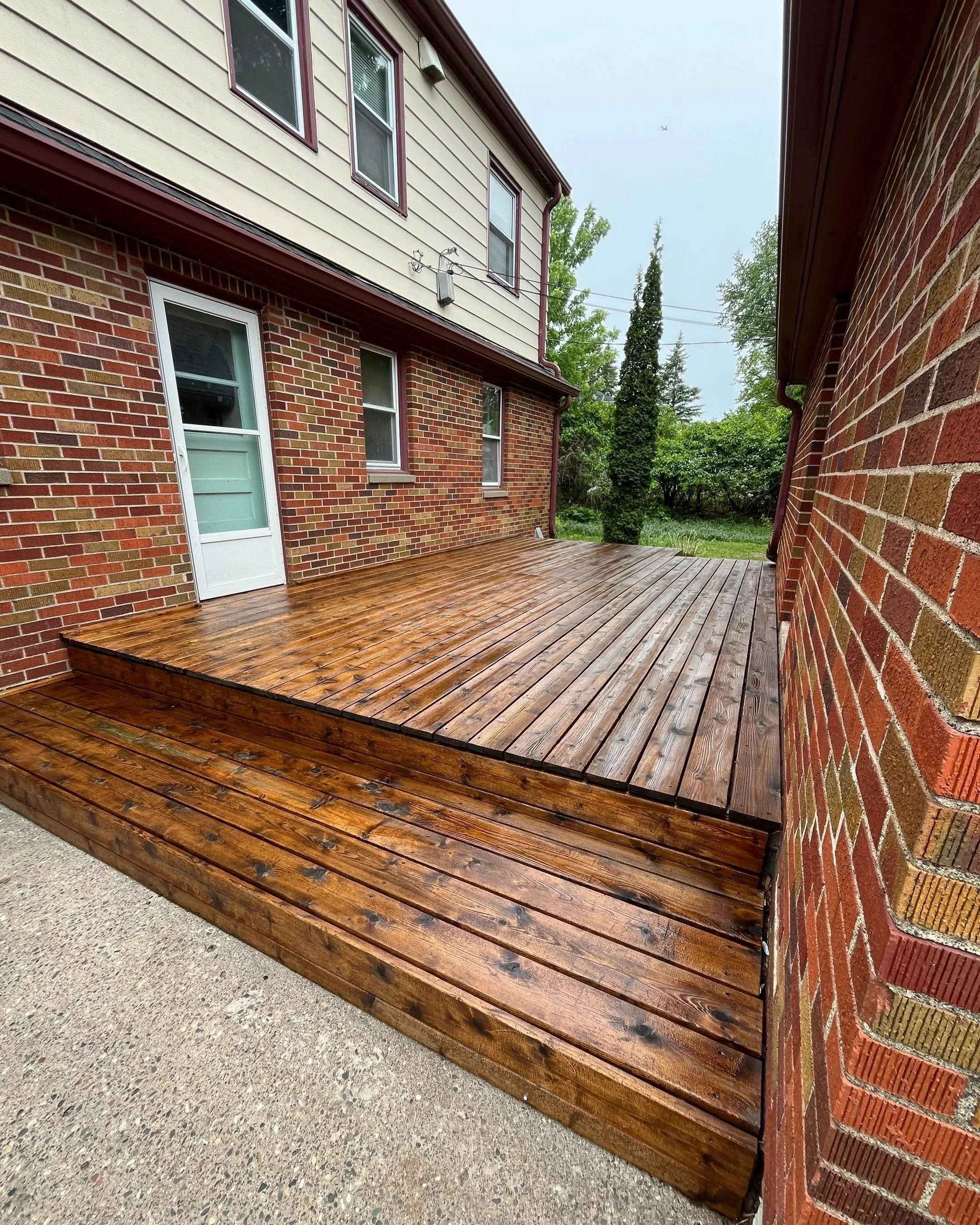 Restored cedar deck after refinishing