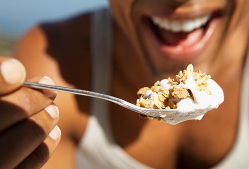 getty_rf_photo_of_woman_eating_cereal.jpg
