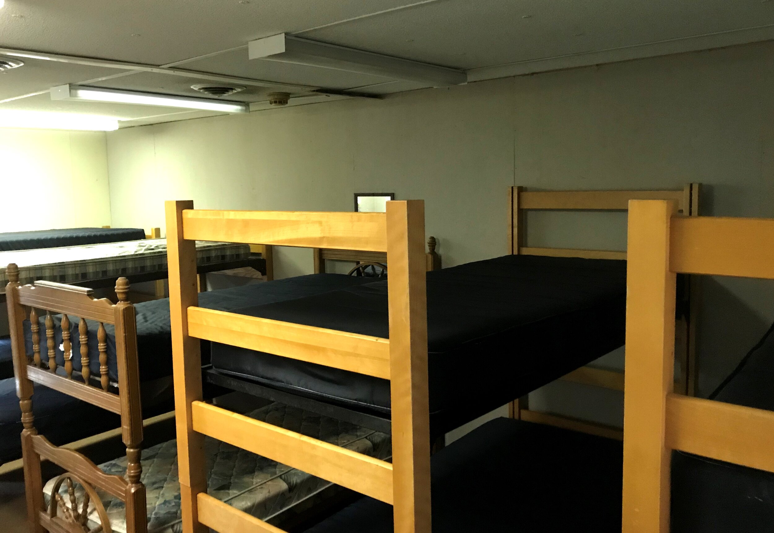  Dorm rooms feature anywhere from 10-30 beds, consisting mostly of wall to wall bunkbeds.  