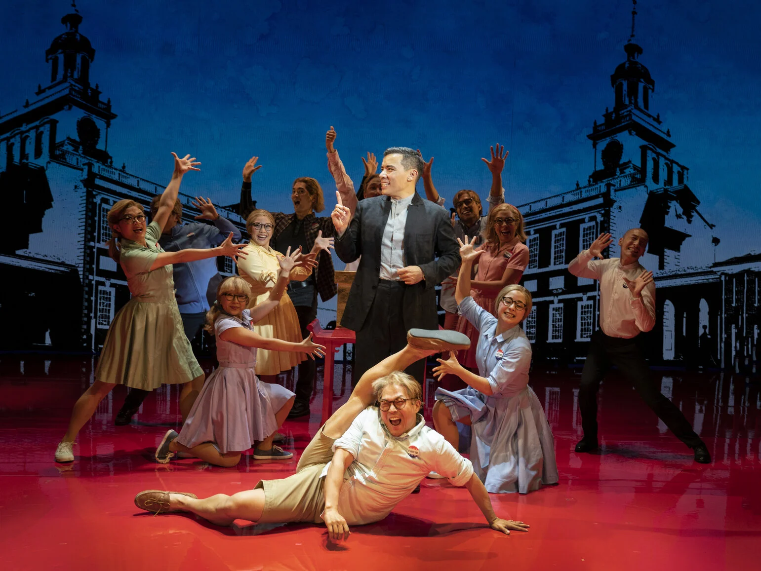 Conrad Ricamora and the company of “Soft Power”. Photo by Joan Marcus.