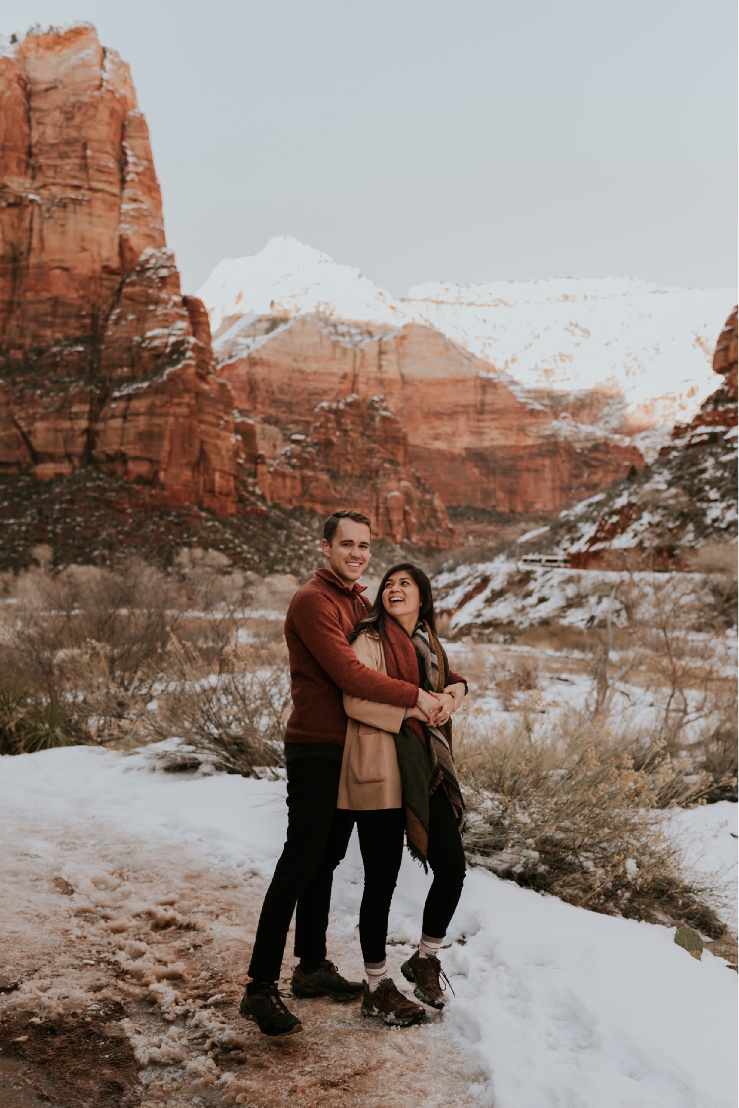 Snowy Zion National Park Adventurous Engagement Session by Carrie Rogers Photography