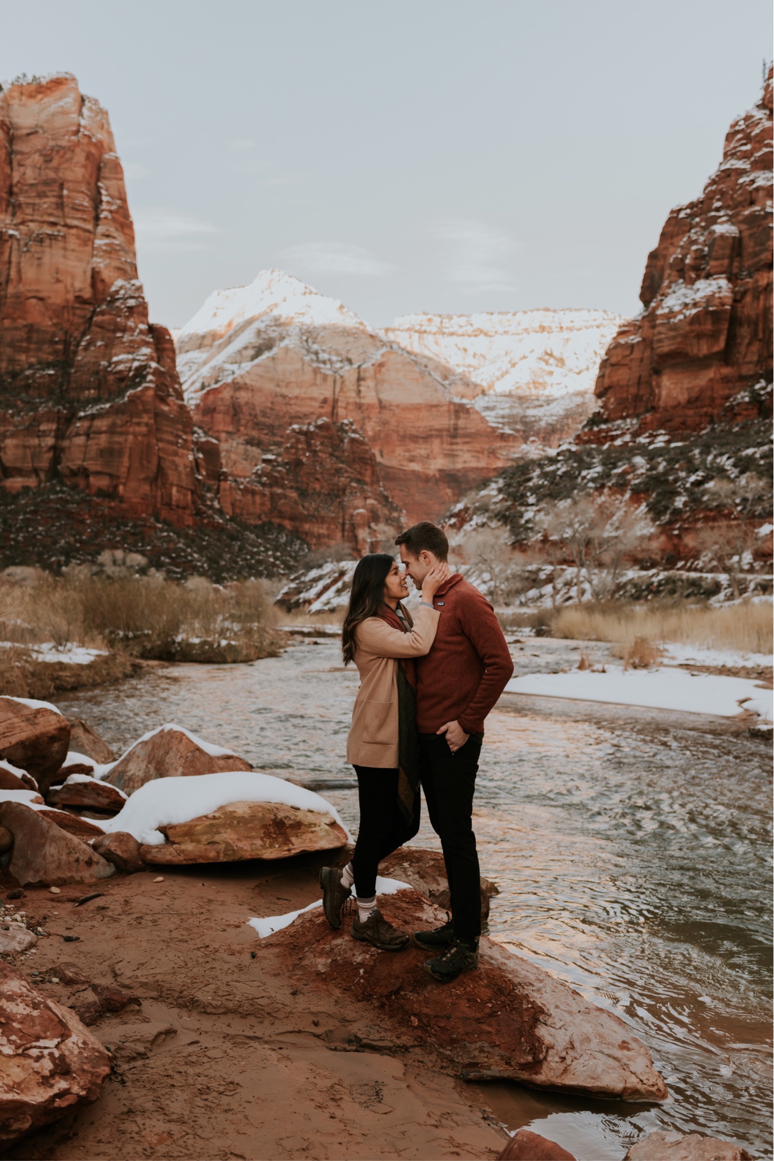 Snowy Zion National Park Adventurous Engagement Session by Carrie Rogers Photography