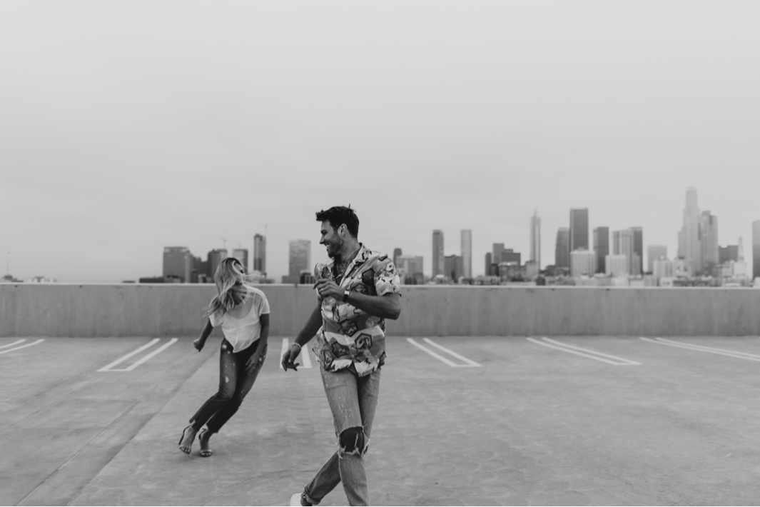 Downtown Los Angeles Rooftop Engagement Session | Carrie Rogers Photography | LA skyline view from rooftop | Urban engagement session | #couples #engagement
