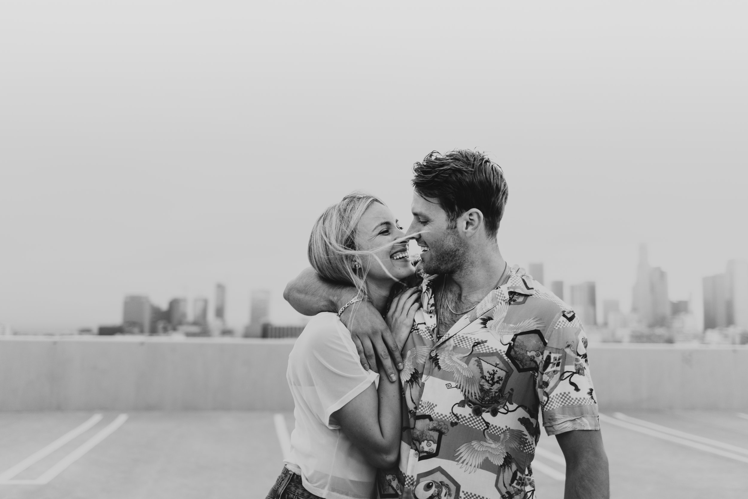 Downtown Los Angeles Rooftop Engagement Session | Carrie Rogers Photography | LA skyline view from rooftop | Urban engagement session | #couples #engagement