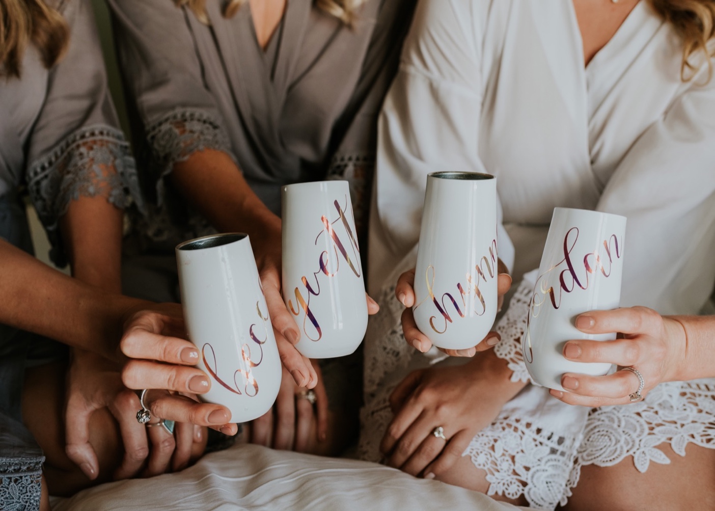 Personalized wine tumblers for bride and bridesmaids.