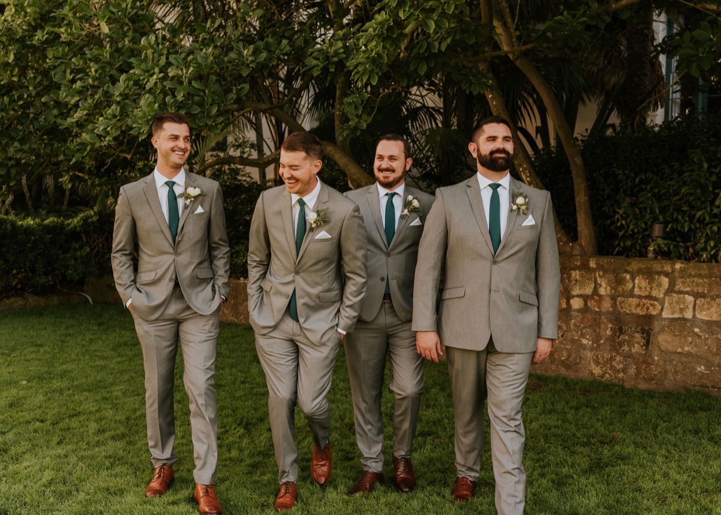 Groomsmen with Groom on outdoor lawn. Santa Barbara Courthouse Wedding.