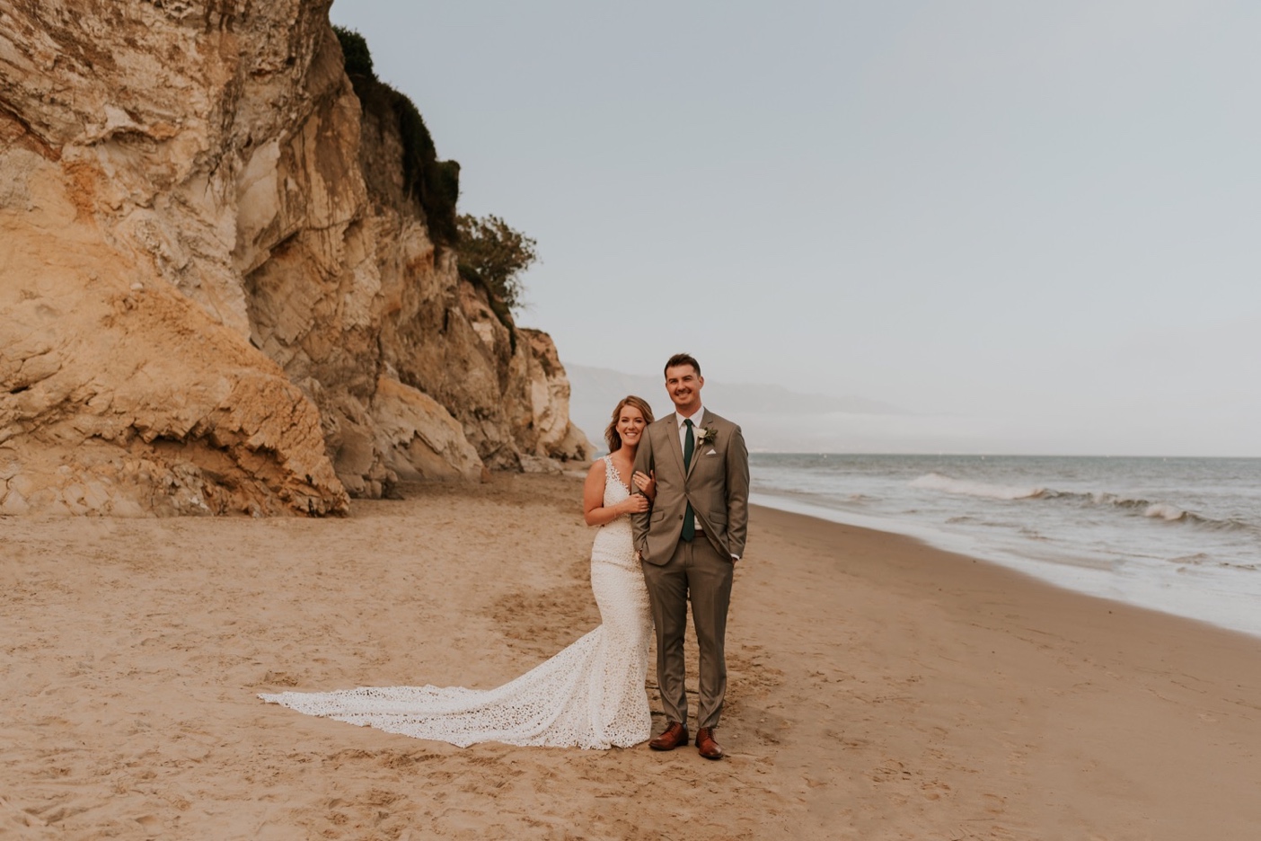 Bride and Groom Portraits on beach in Santa Barbara, California. Santa Barbara Wedding.