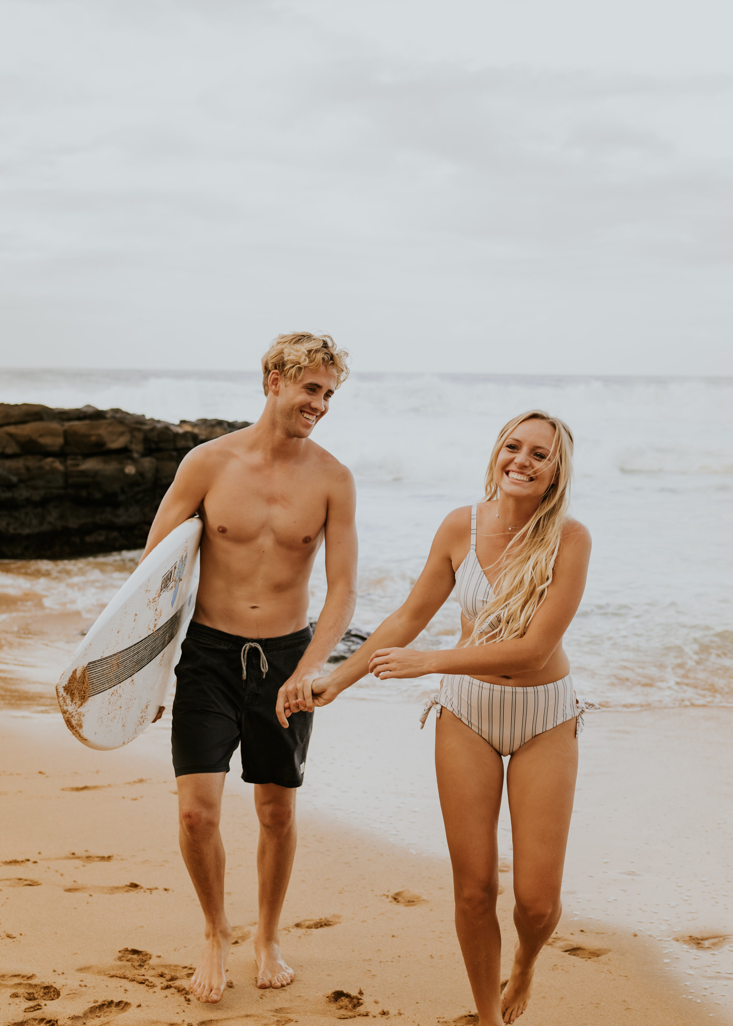  Kauai Beach Engagement Session | Secret Beach Kauai | Hawaii Couple Photos | Kauai Elopement Photographer | Hawaii Engagement | Destination Wedding Photographer  | Surfboard Engagement Session