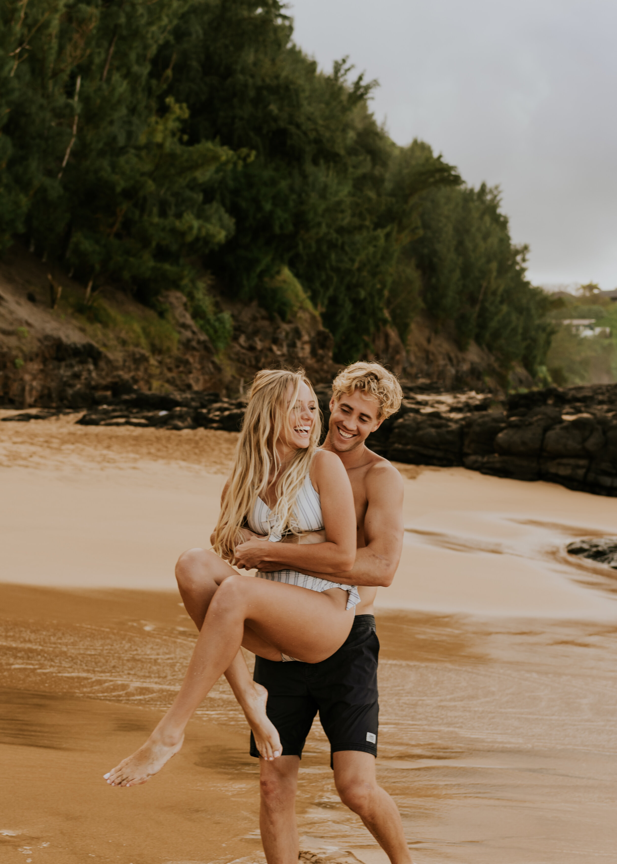  Kauai Beach Engagement Session | Secret Beach Kauai | Hawaii Couple Photos | Kauai Elopement Photographer | Hawaii Engagement | Destination Wedding Photographer  | Surfboard Engagement Session