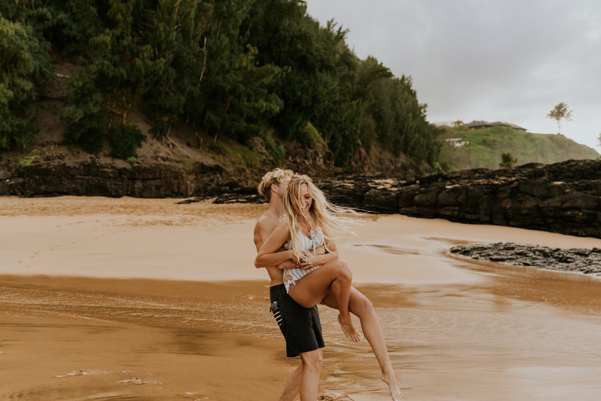  Kauai Beach Engagement Session | Secret Beach Kauai | Hawaii Couple Photos | Kauai Elopement Photographer | Hawaii Engagement | Destination Wedding Photographer  | Surfboard Engagement Session