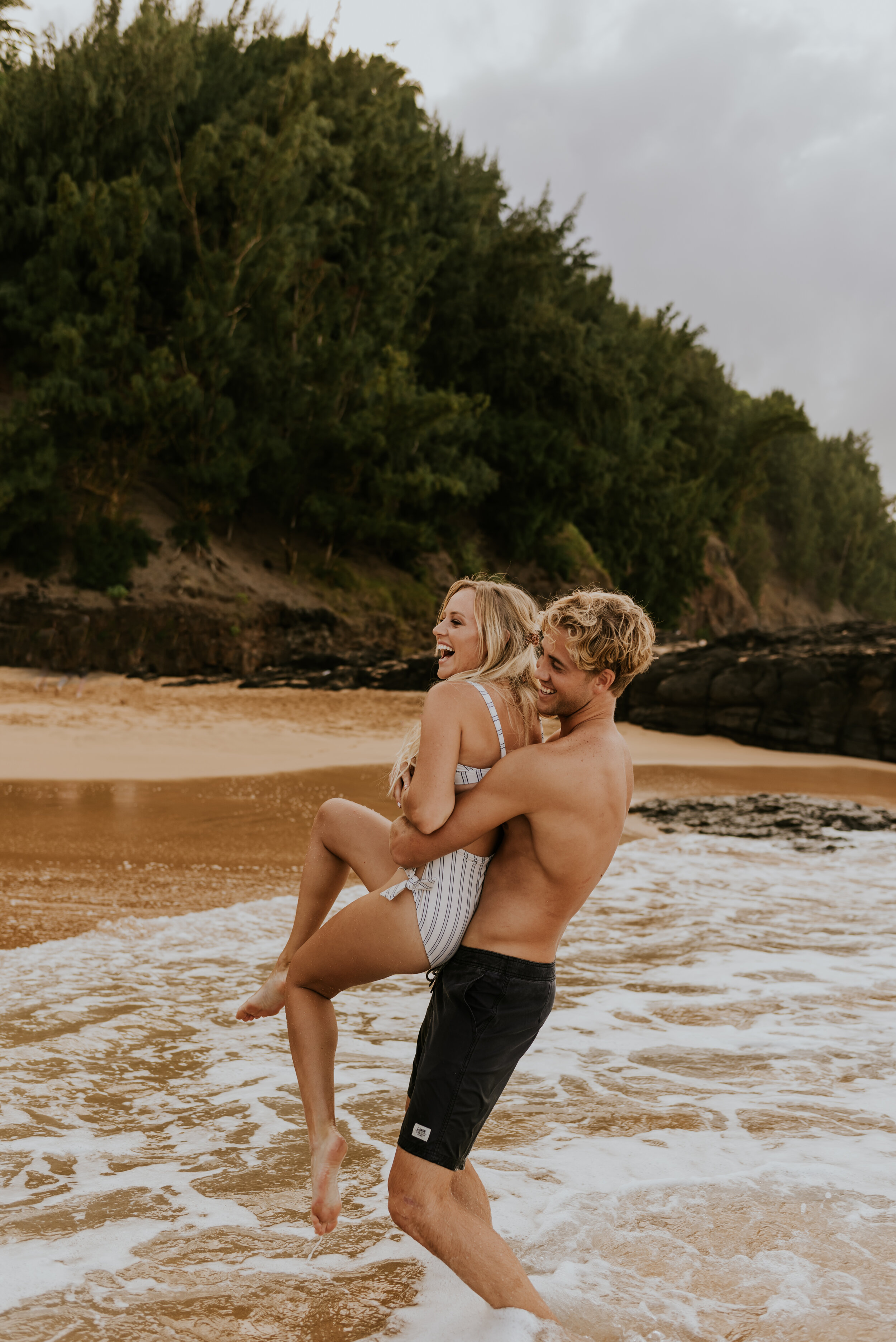  Kauai Beach Engagement Session | Secret Beach Kauai | Hawaii Couple Photos | Kauai Elopement Photographer | Hawaii Engagement | Destination Wedding Photographer  | Surfboard Engagement Session