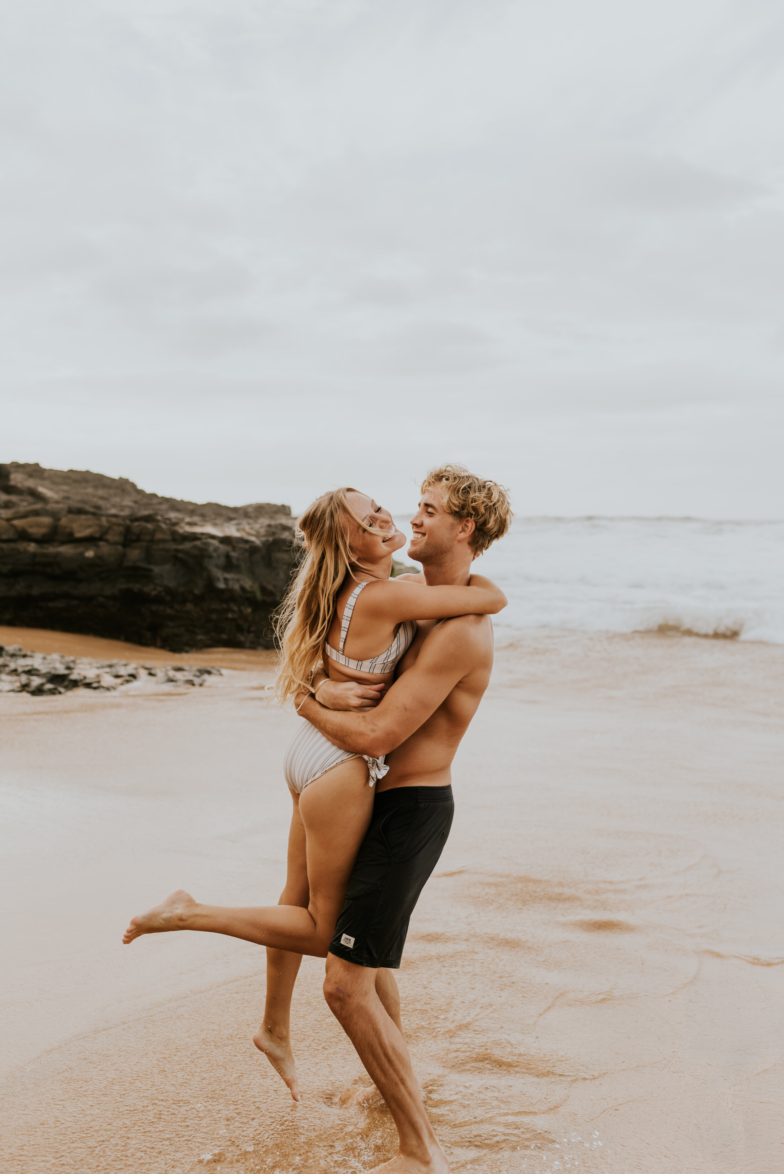  Kauai Beach Engagement Session | Secret Beach Kauai | Hawaii Couple Photos | Kauai Elopement Photographer | Hawaii Engagement | Destination Wedding Photographer  | Surfboard Engagement Session