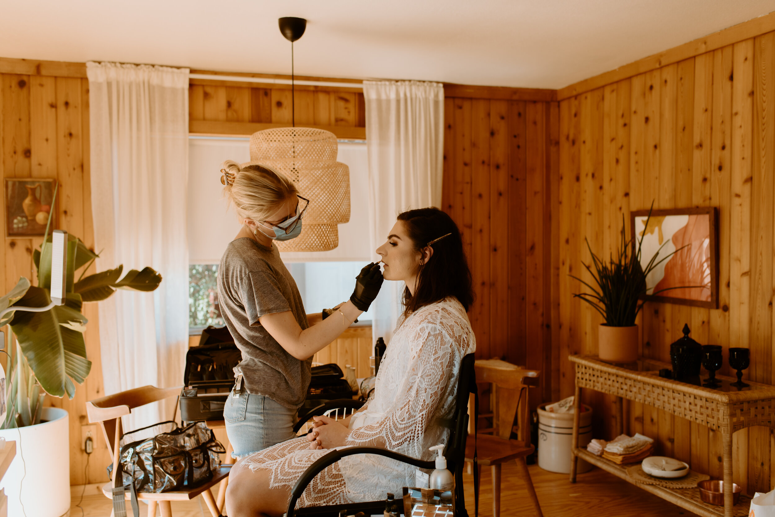 Laid-back Joshua Tree elopement | Boho bride in Grace Loves Lace dress | Joshua Tree elopement photographer | couple getting ready at airbnb for elopement