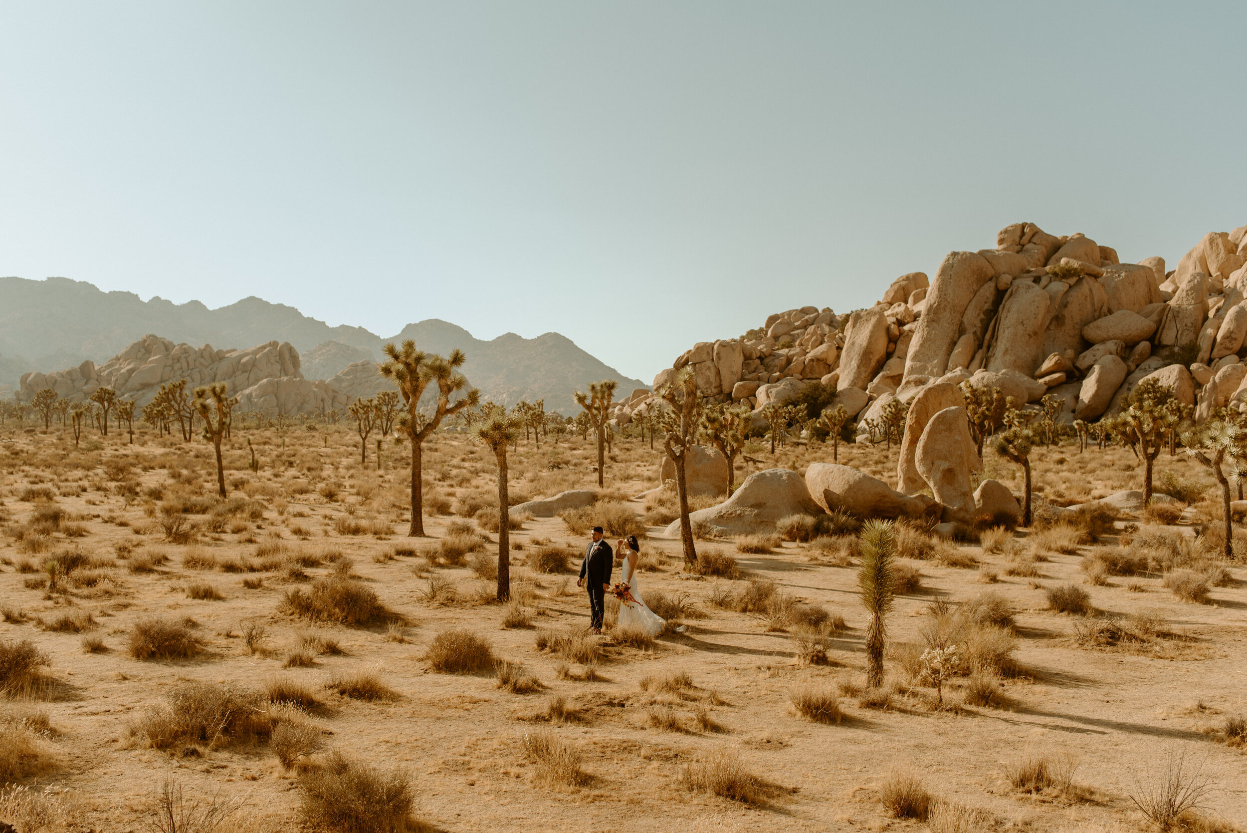 Laid-back Joshua Tree elopement | Boho bride in Grace Loves Lace dress | Joshua Tree elopement photographer | adventurous desert elopement | best place to elope in california