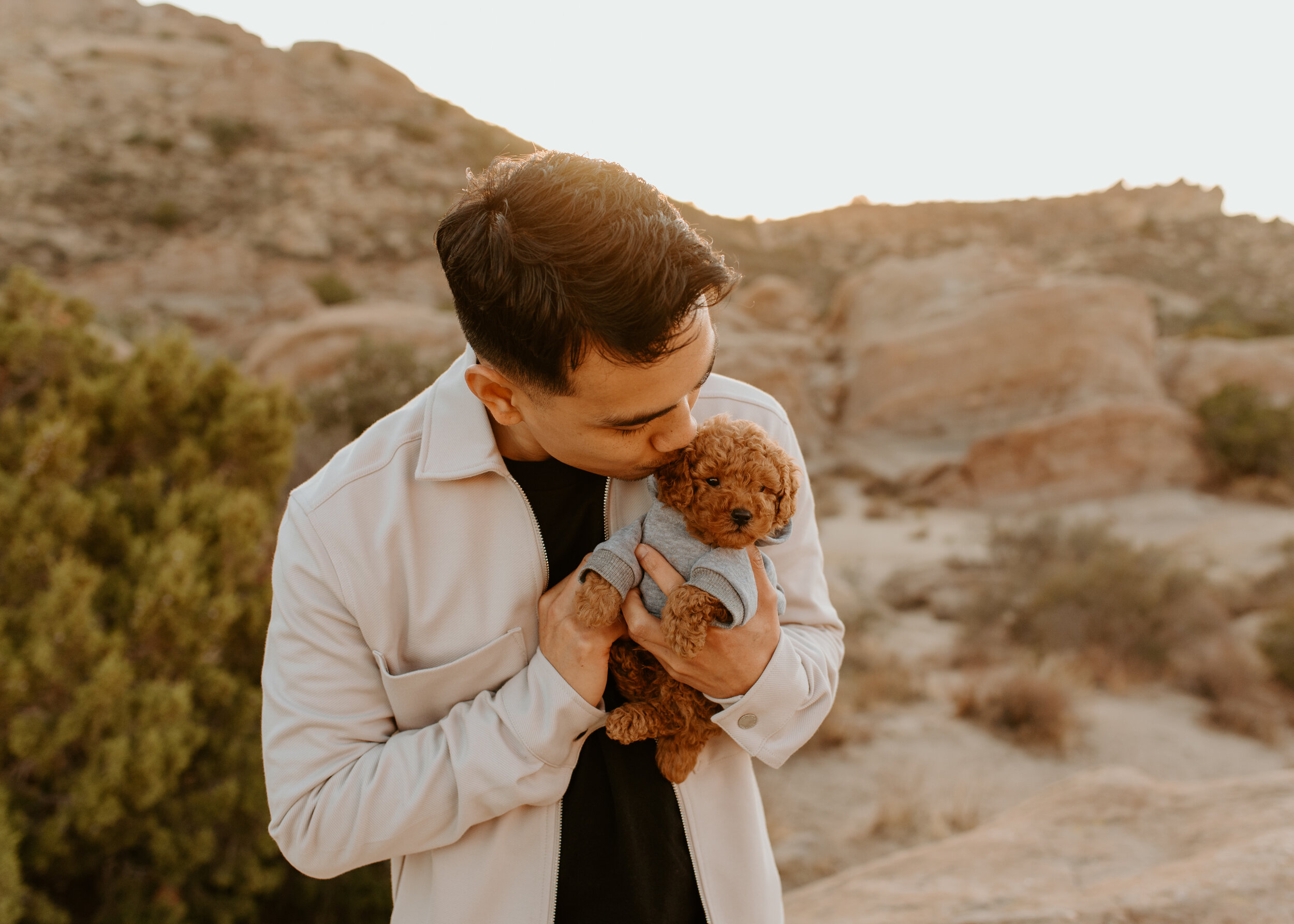 Couple photos with dog | red toy poodle puppy | earthy colored outfits for couples | what to wear for engagement session 
