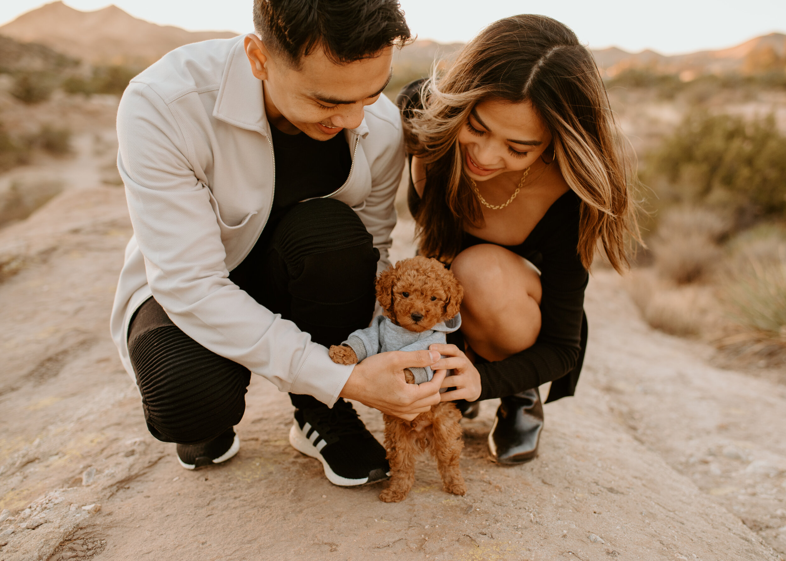 Couple photos with dog | red toy poodle puppy | earthy colored outfits for couples | what to wear for engagement session 