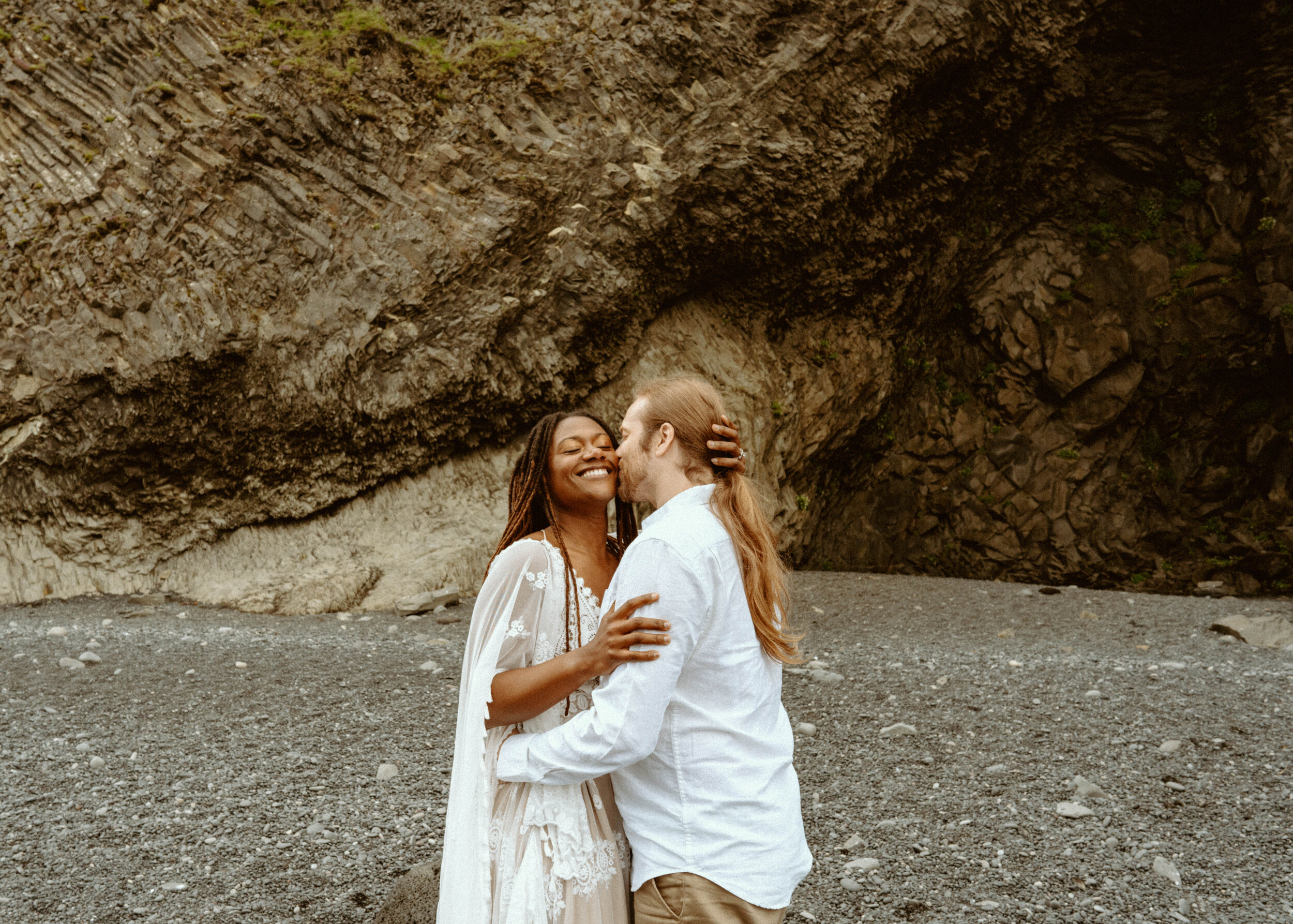 Iceland elopement photographer | Destination Elopement in Iceland | Reynisfara Black Sand Beach wedding | Iceland Waterfall adventure elopement | adventure couple 