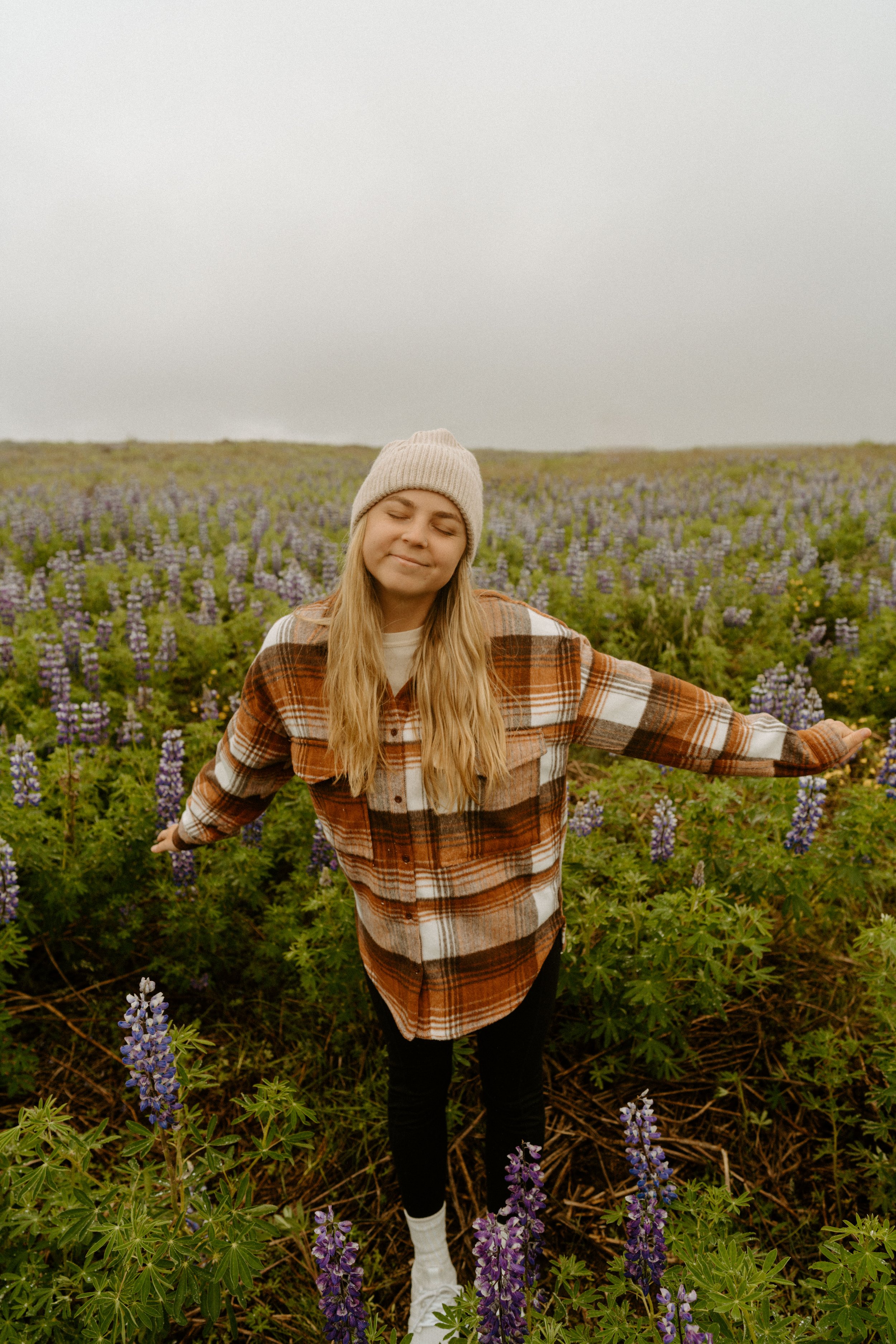A week in Iceland - travel itinerary and guide by an Iceland elopement photographer - iceland lupine field in the summer